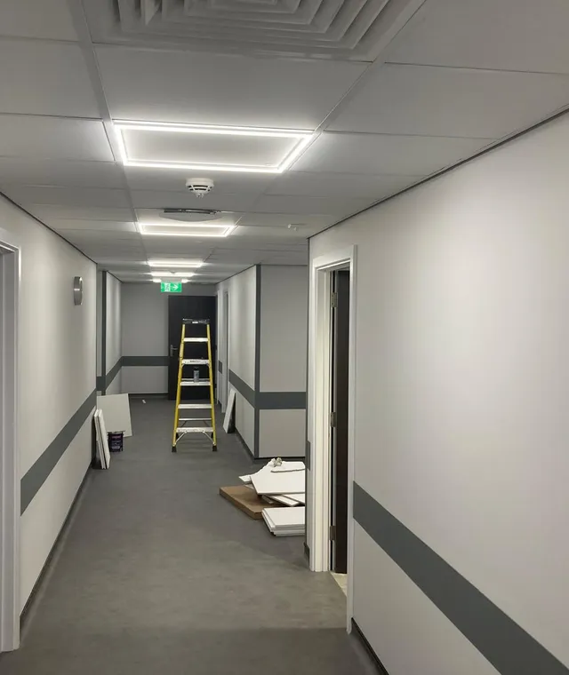 Freshly painted commercial corridor in Derby by Saxby Decor