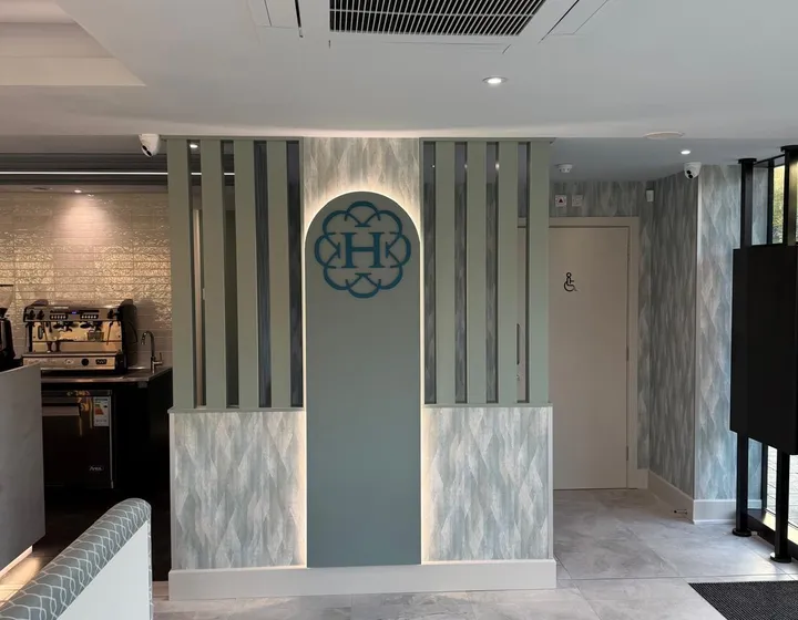 Commercial wallpaper feature wall hanging project in Derby